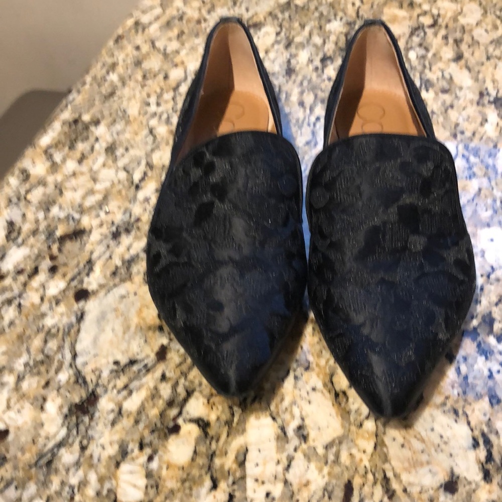 Black brocade flats by Calvin Klein
